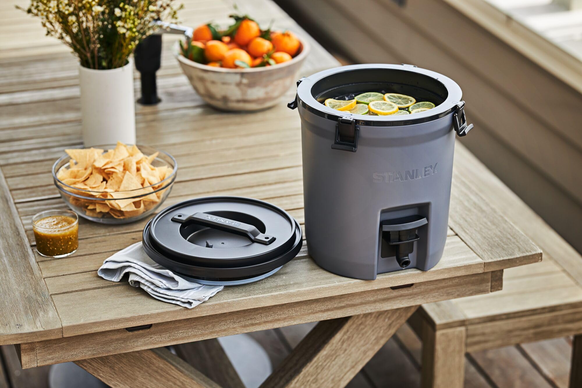 Stanley Adventure Fast Flow Water Jug 2 Gallon | Leakproof Ice Water Dispenser | Insulated Beverage Cooler | Easy Pour Spigot and Latched Foam Lid | BPA-Free | Charcoal