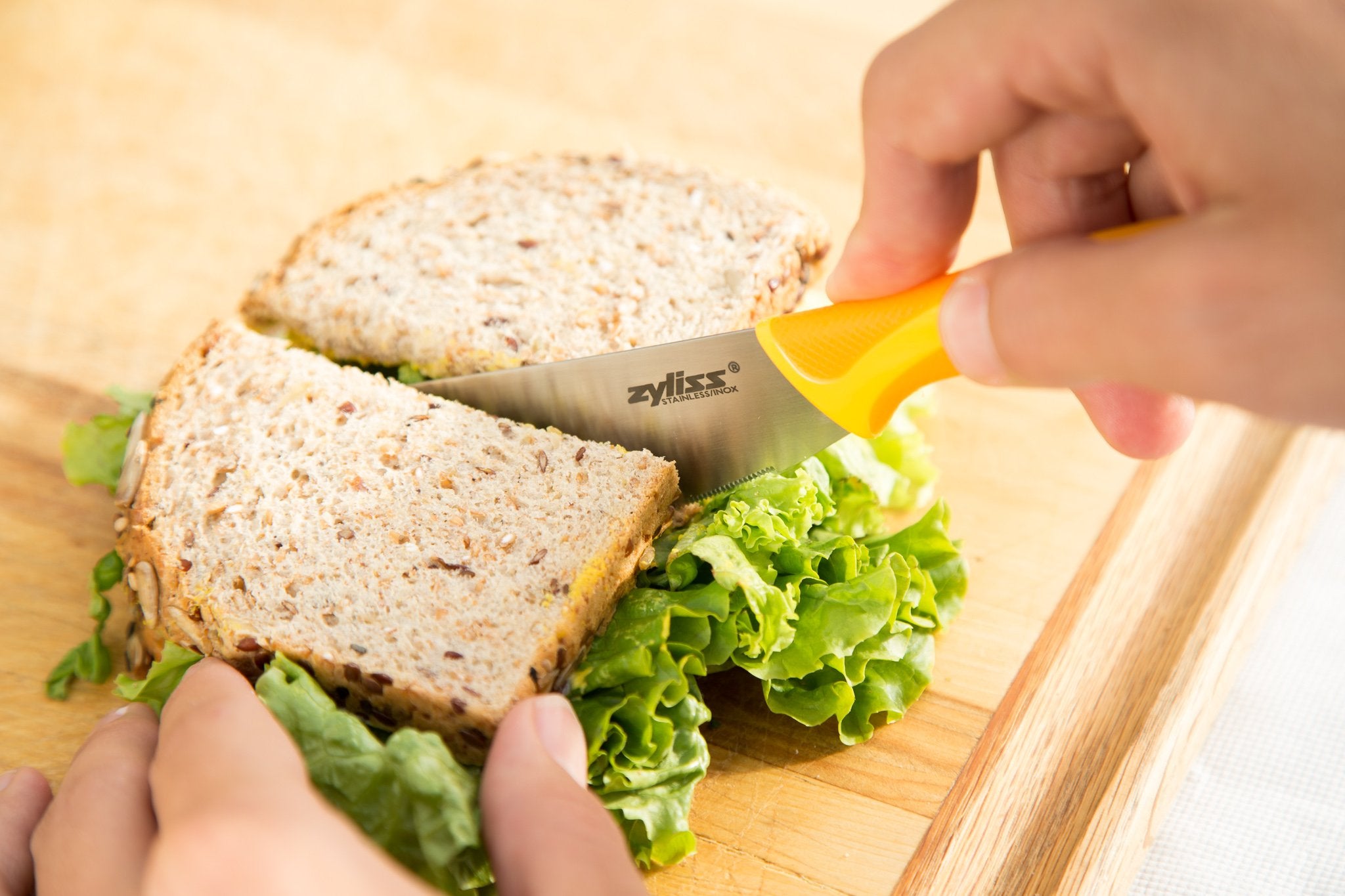 Zyliss Sandwich Knife & Condiment Spreader - Sandwich Spreader Knife for Butter, Cream Cheese, & Jellies - Butter for Bagels & Toast - Orange