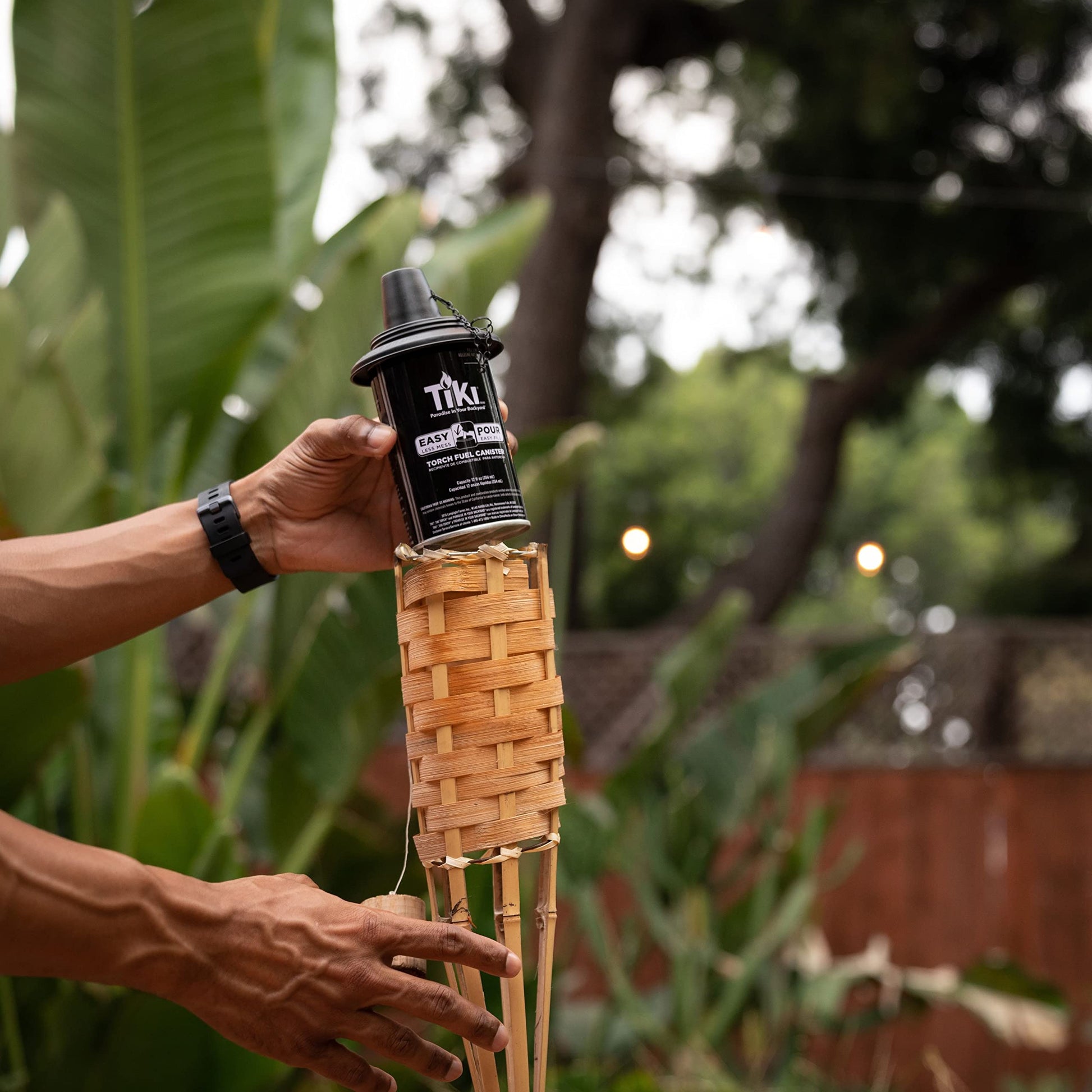 TIKI Bamboo Tiki Torches 4-Pack – Weather-Resistant Outdoor Décor with Easy-Pour Wide-Mouth Canister Refill for Patio, Garden, Backyard, and Parties, 57-Inch Citronella Torches