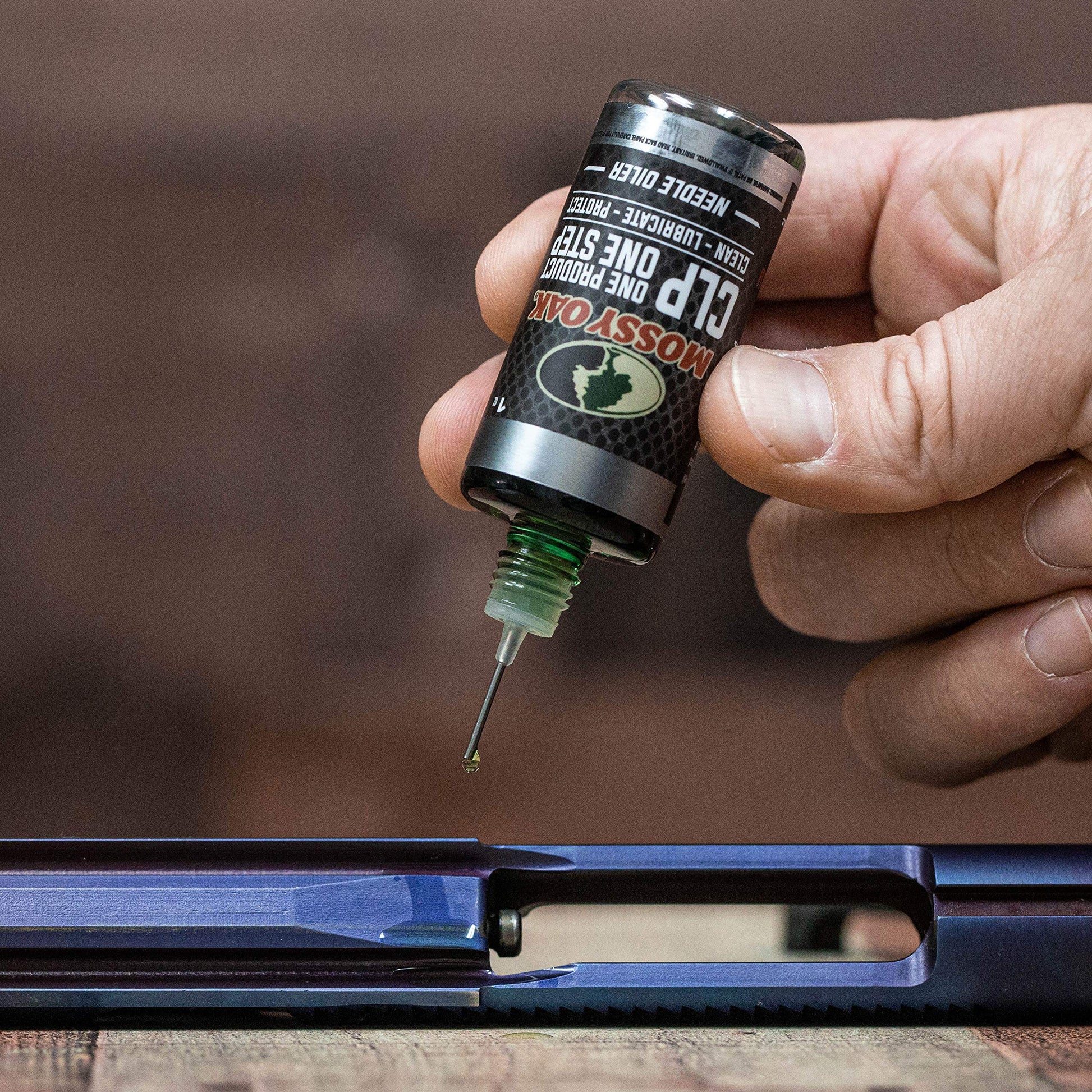 Mossy Oak Gun Oil - CLP Gun Lubricant - Premium Firearm Maintenance - Rust Preventative - 2 oz. Fine Mist Pump Sprayer & 1 oz. Needle Oiler